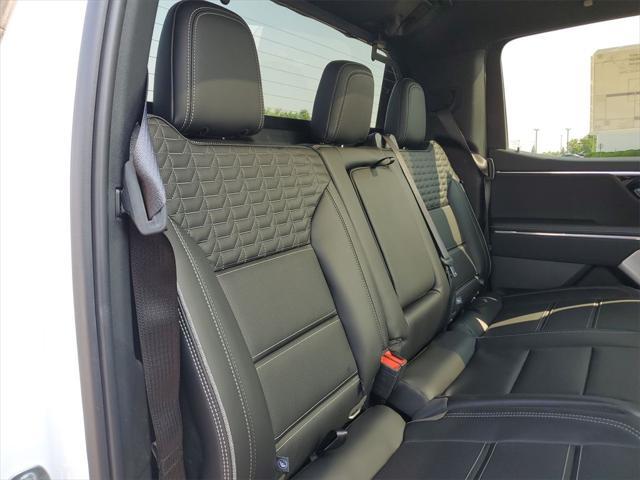 Photo of 2025 Summit White GMC Sierra EV