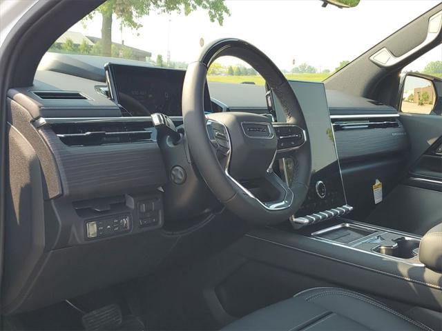 Photo of 2025 Summit White GMC Sierra EV