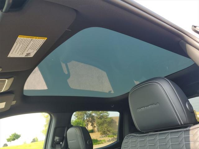 Photo of 2025 Summit White GMC Sierra EV