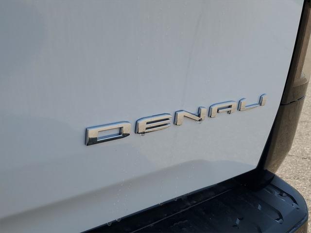 Photo of 2025 Summit White GMC Sierra EV