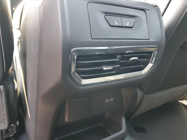 Photo of 2025 Summit White GMC Sierra EV