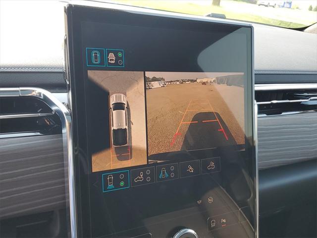 Photo of 2025 Summit White GMC Sierra EV