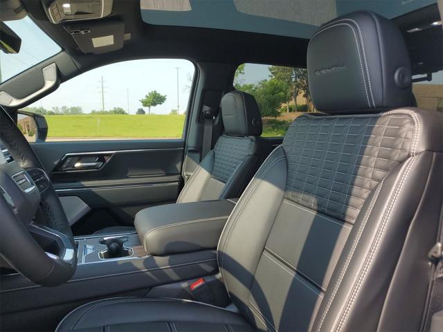 Photo of 2025 Summit White GMC Sierra EV