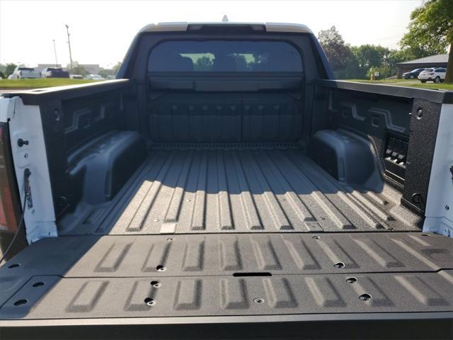 Photo of 2025 Summit White GMC Sierra EV