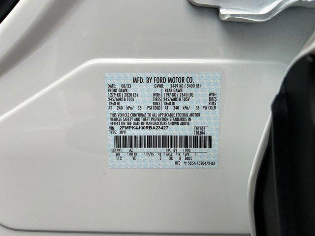 Photo of 2024 White Metallic Ford Edge