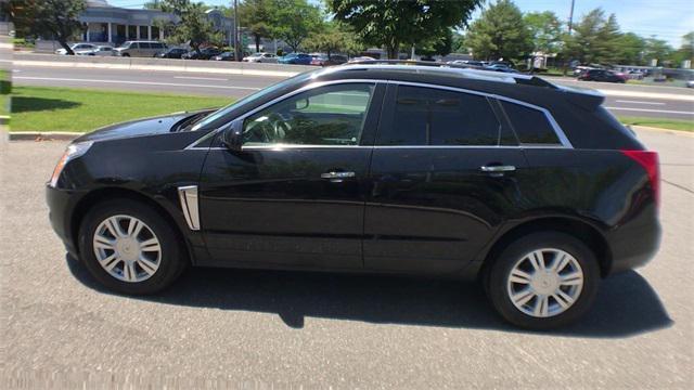 Photo of 2016 Black Raven Cadillac SRX