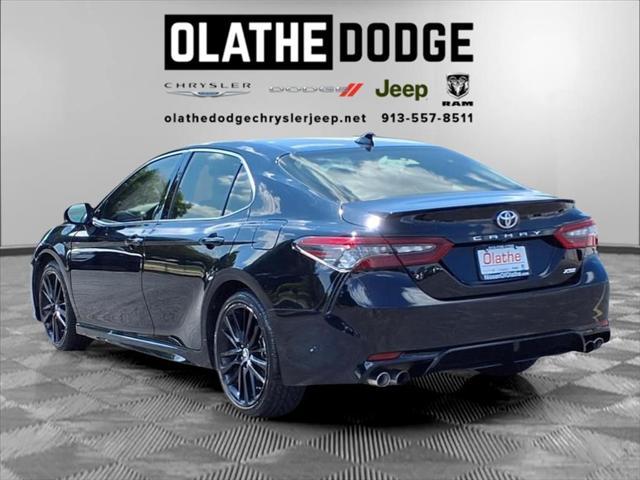 Photo of 2024 Midnight Black Metallic Toyota Camry