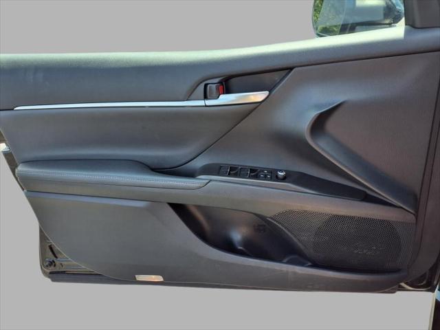 Photo of 2024 Midnight Black Metallic Toyota Camry