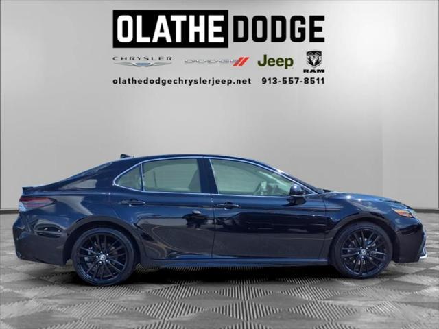 Photo of 2024 Midnight Black Metallic Toyota Camry