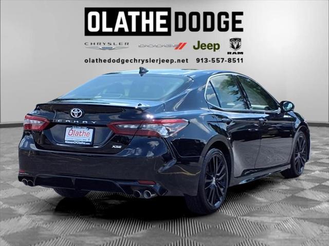 Photo of 2024 Midnight Black Metallic Toyota Camry