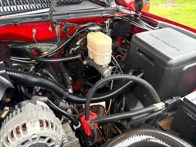 Photo of 2002 Fire Red GMC Sierra 1500
