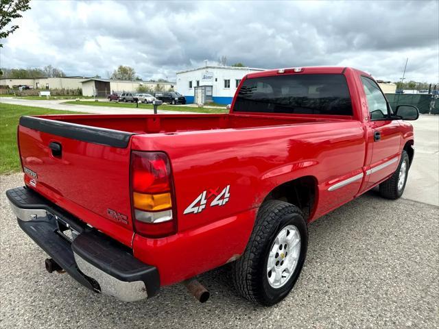 Photo of 2002 Fire Red GMC Sierra 1500