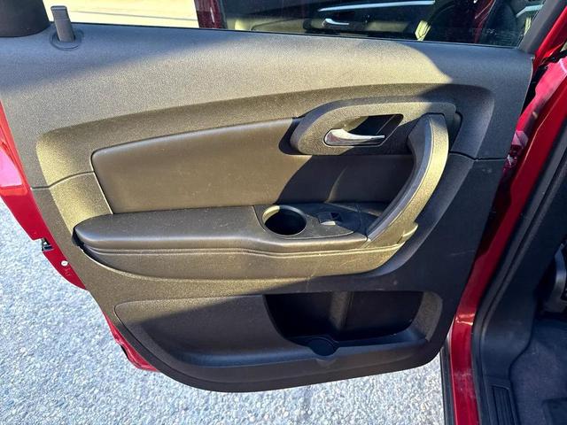 Photo of 2012 Crystal Red Tintcoat Chevrolet Traverse