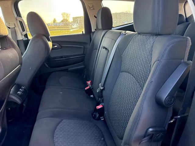Photo of 2012 Crystal Red Tintcoat Chevrolet Traverse