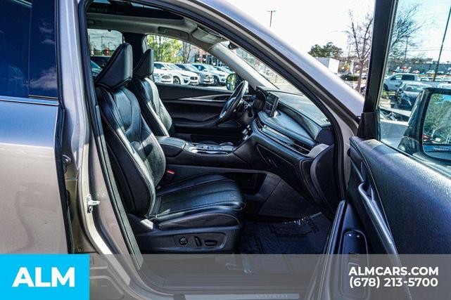 Photo of 2024 Warm Titanium INFINITI QX60