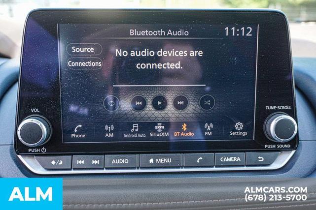 Photo of 2023 Glacier White Nissan Rogue