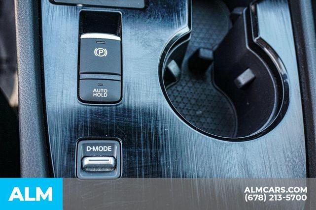 Photo of 2023 Glacier White Nissan Rogue
