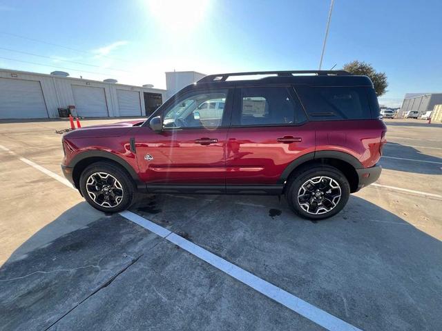 Photo of 2025 Ruby Red Metallic Ford Bronco Sport