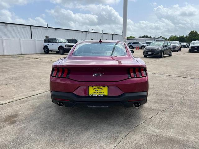 Photo of 2025 Magenta Red Ford Mustang
