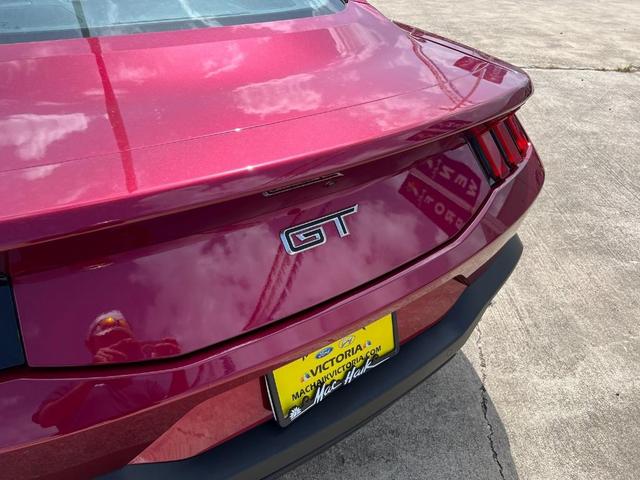 Photo of 2025 Magenta Red Ford Mustang