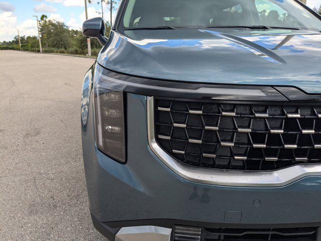 Photo of 2026 Astra Blue Kia Carnival