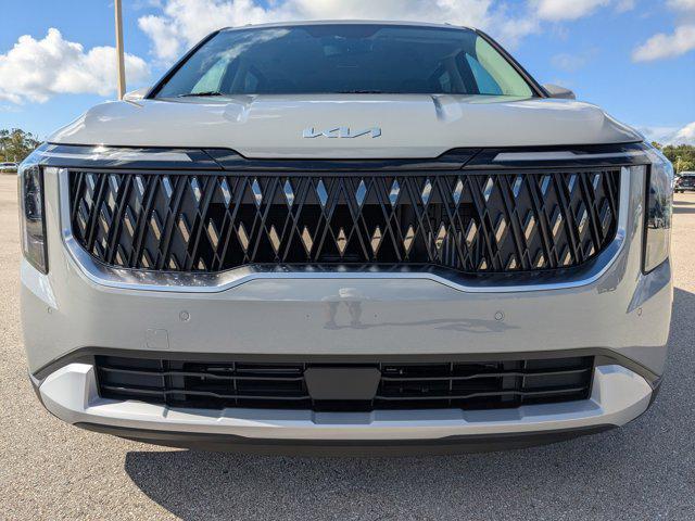 Photo of 2026 Ceramic White Kia Carnival Hybrid