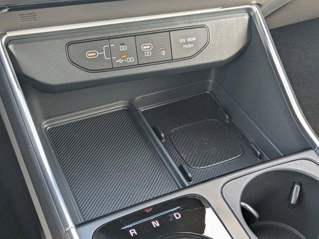 Photo of 2026 Ceramic White Kia Carnival Hybrid