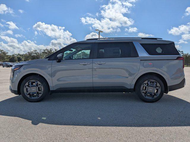 Photo of 2026 Ceramic White Kia Carnival Hybrid