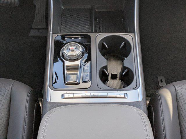 Photo of 2026 Ceramic White Kia Carnival Hybrid