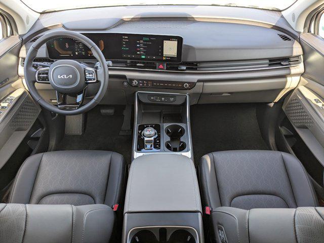 Photo of 2026 Ceramic White Kia Carnival Hybrid