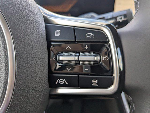 Photo of 2026 Ceramic White Kia Carnival Hybrid