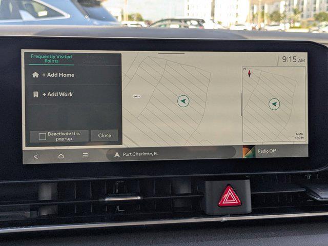 Photo of 2026 Ceramic White Kia Carnival Hybrid