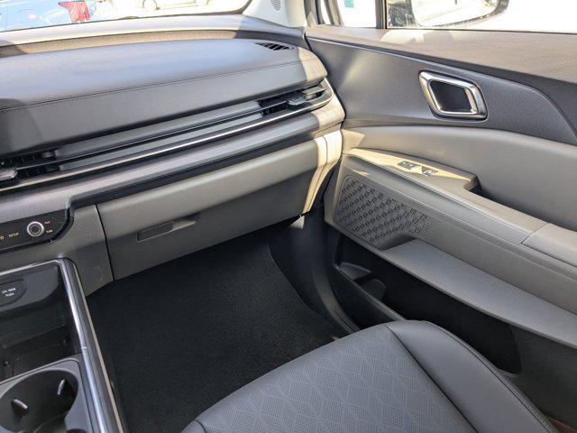 Photo of 2026 Ceramic White Kia Carnival Hybrid