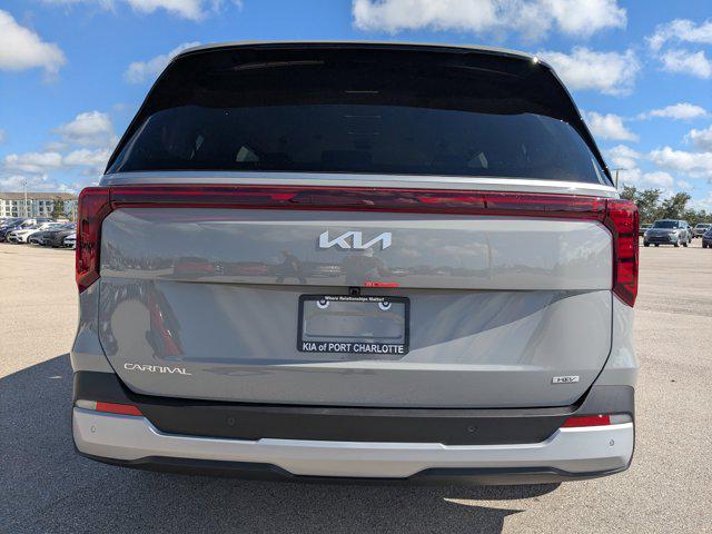 Photo of 2026 Ceramic White Kia Carnival Hybrid
