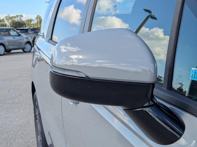 Photo of 2026 Ceramic White Kia Carnival Hybrid