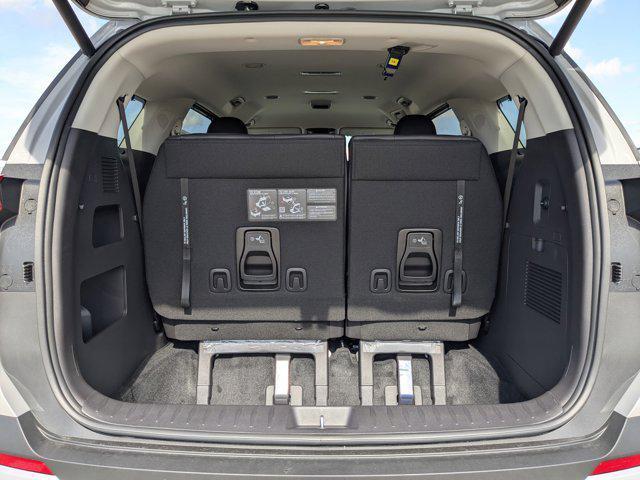 Photo of 2026 Ceramic White Kia Carnival Hybrid