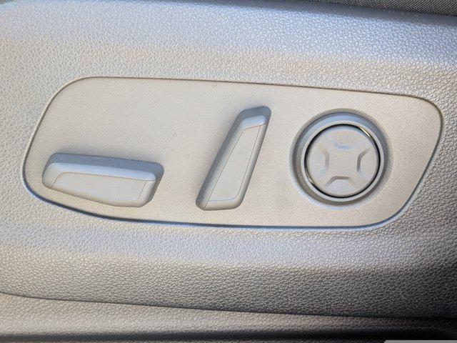 Photo of 2026 Ceramic White Kia Carnival Hybrid