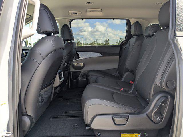 Photo of 2026 Ceramic White Kia Carnival Hybrid