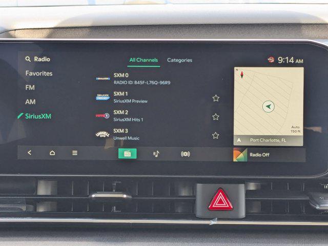 Photo of 2026 Ceramic White Kia Carnival Hybrid