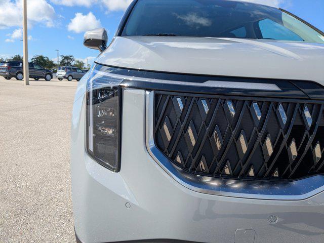 Photo of 2026 Ceramic White Kia Carnival Hybrid