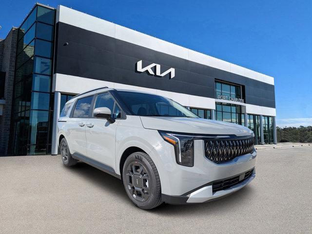Photo of 2026 Ceramic White Kia Carnival Hybrid