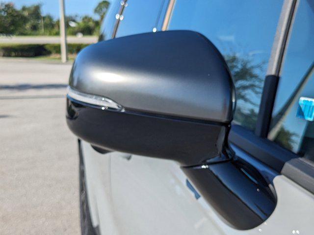Photo of 2026 Ceramic White Kia Carnival Hybrid