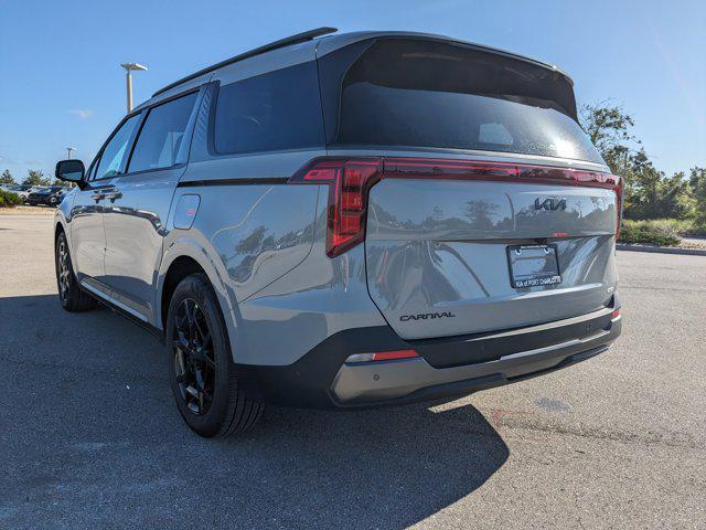 Photo of 2026 Ceramic White Kia Carnival Hybrid