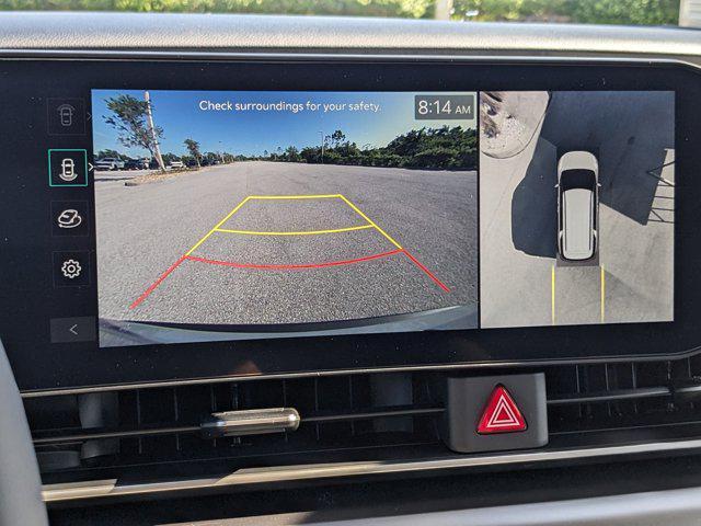 Photo of 2026 Ceramic White Kia Carnival Hybrid