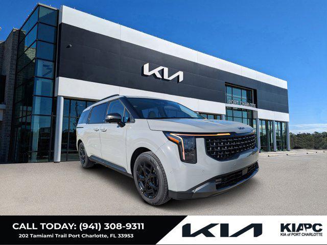 Photo of 2026 Ceramic White Kia Carnival Hybrid