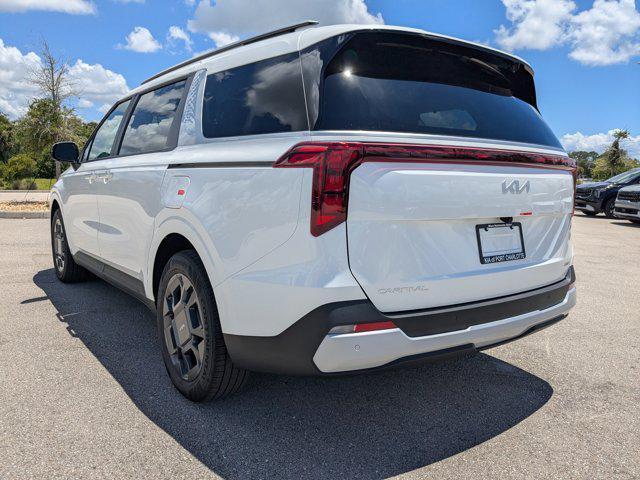 Photo of 2026 Snow White Pearl Kia Carnival Hybrid