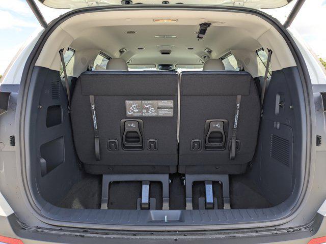 Photo of 2026 Snow White Pearl Kia Carnival Hybrid