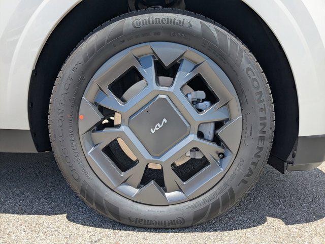 Photo of 2026 Snow White Pearl Kia Carnival Hybrid