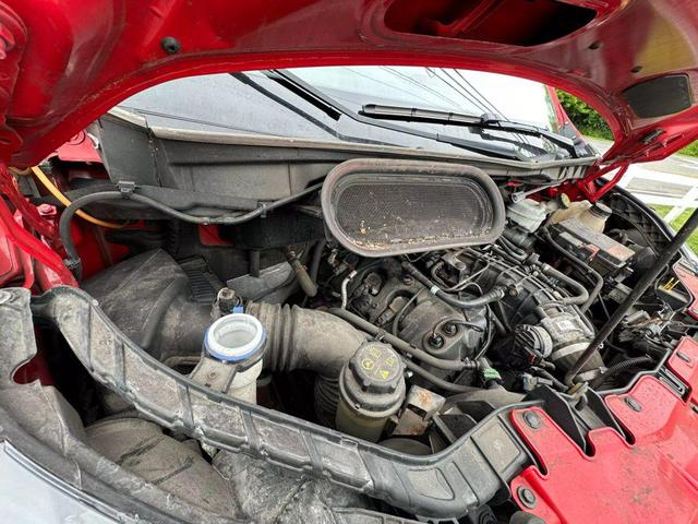 Photo of 2018 Red Ford Transit-250