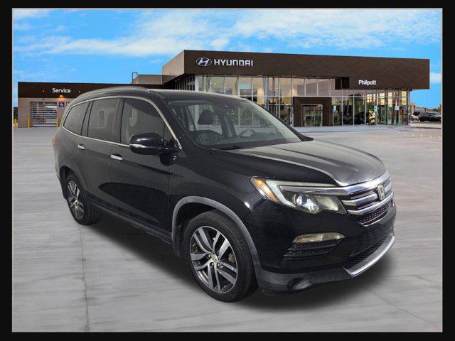 Photo of 2018 Crystal Black Pearl Honda Pilot